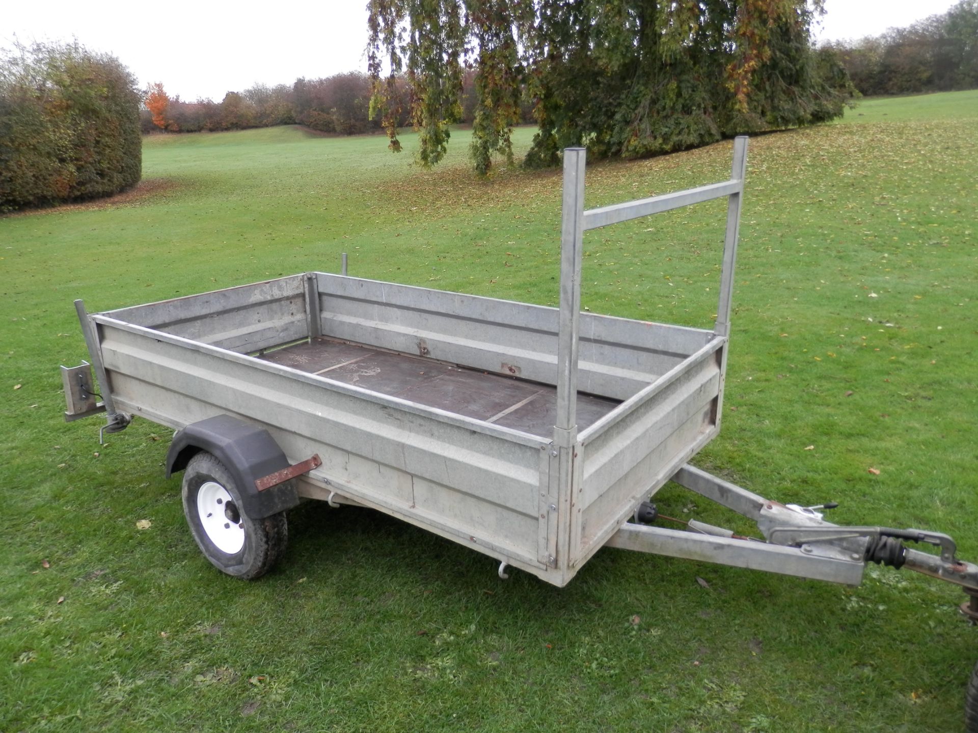 GOOD SOLID 8 X 4' GALVANIZED TRAILER, 1.5 TONNE. DROP REAR FOR EASY LOADING.