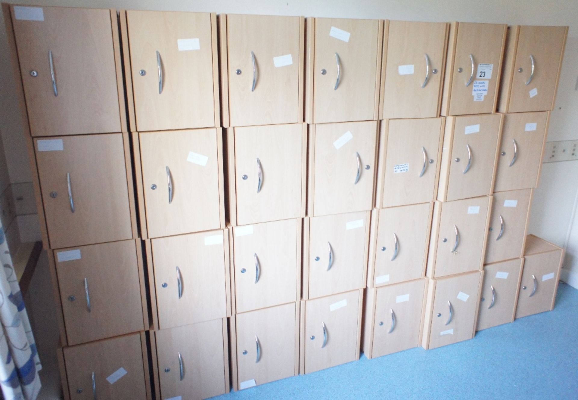 29 lightwood single wall mounted personal lockers (25 keys with staff) (located in room 13)
