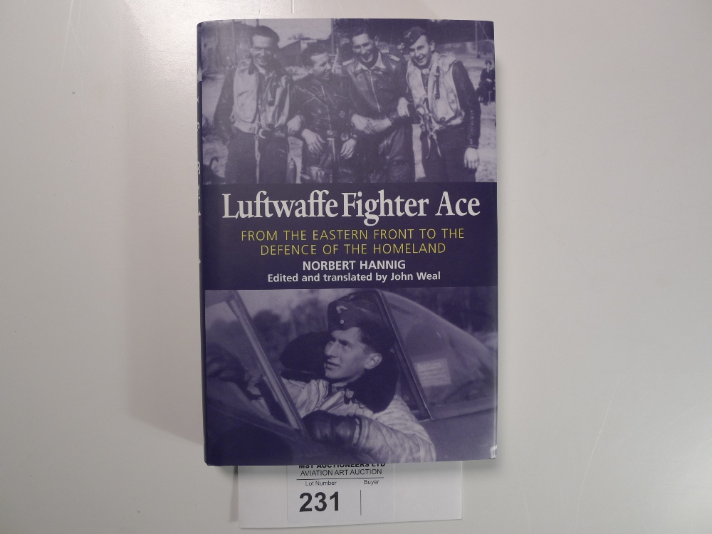 a hardback book “Luftwaffe Fighter Ace - Norbert Hannig” translated by John Weal signed by ME 262