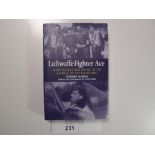 a hardback book “Luftwaffe Fighter Ace - Norbert Hannig” translated by John Weal signed by ME 262