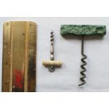 One small mottled green corkscrew and a miniature Ivory handle perfume screw