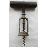 An open frame/two pillar corkscrew with spring marked: HERCULES, with dark-wood handle