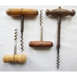 Three dark-wood handle corkscrews and a bamboo handle corkscrew