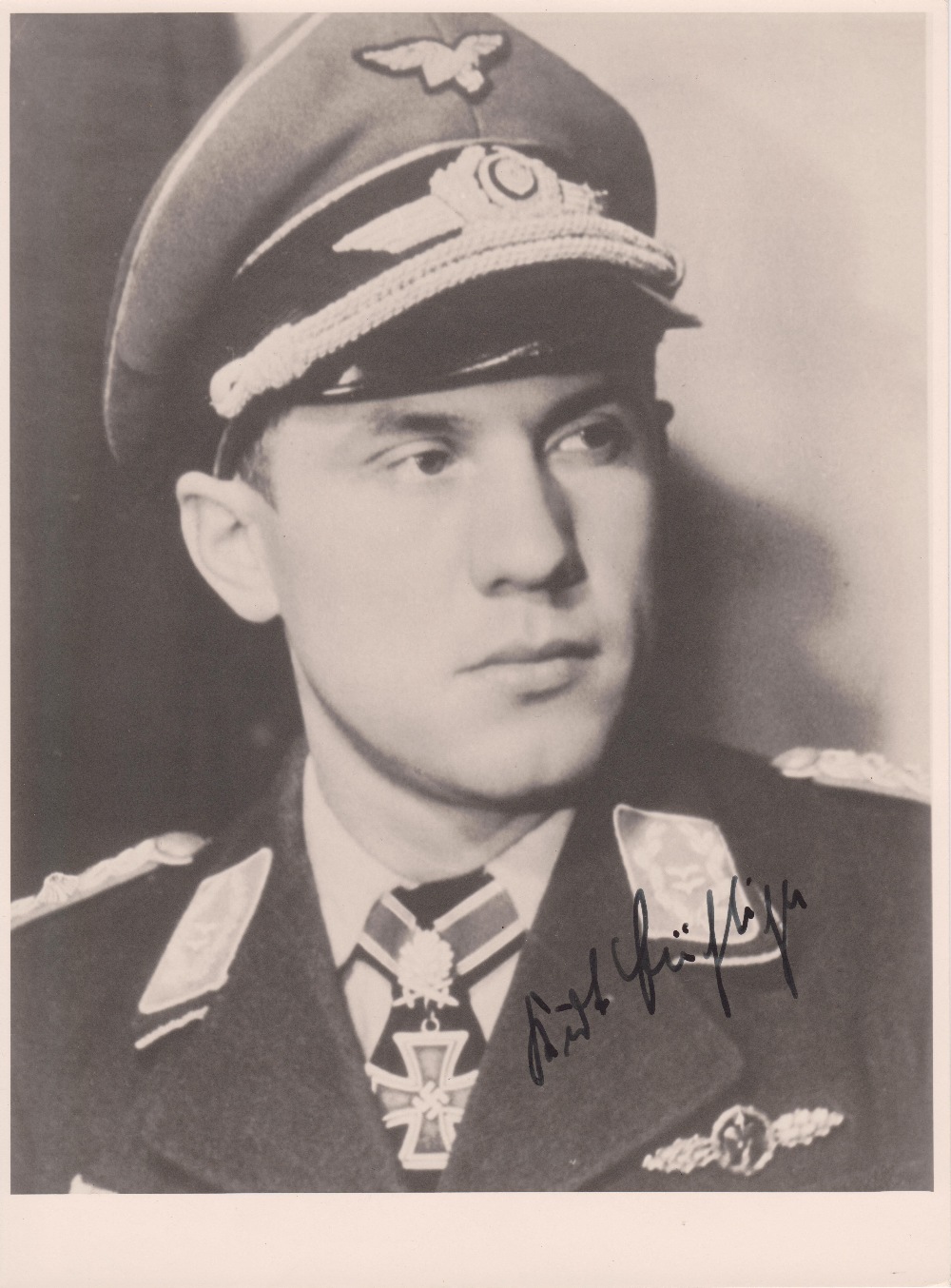 Unteroffizier Kurt Buhligen (1917 – 1985) signature on black and white photograph size approx 24cm x