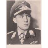 Unteroffizier Kurt Buhligen (1917 – 1985) signature on black and white photograph size approx 24cm x