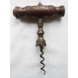 A dark-wood (probably Rosewood) handle corkscrew with dog-teeth grips and hole for brush (brush
