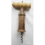 A brass barrel corkscrew with bone handle and hole for brush (brush missing)