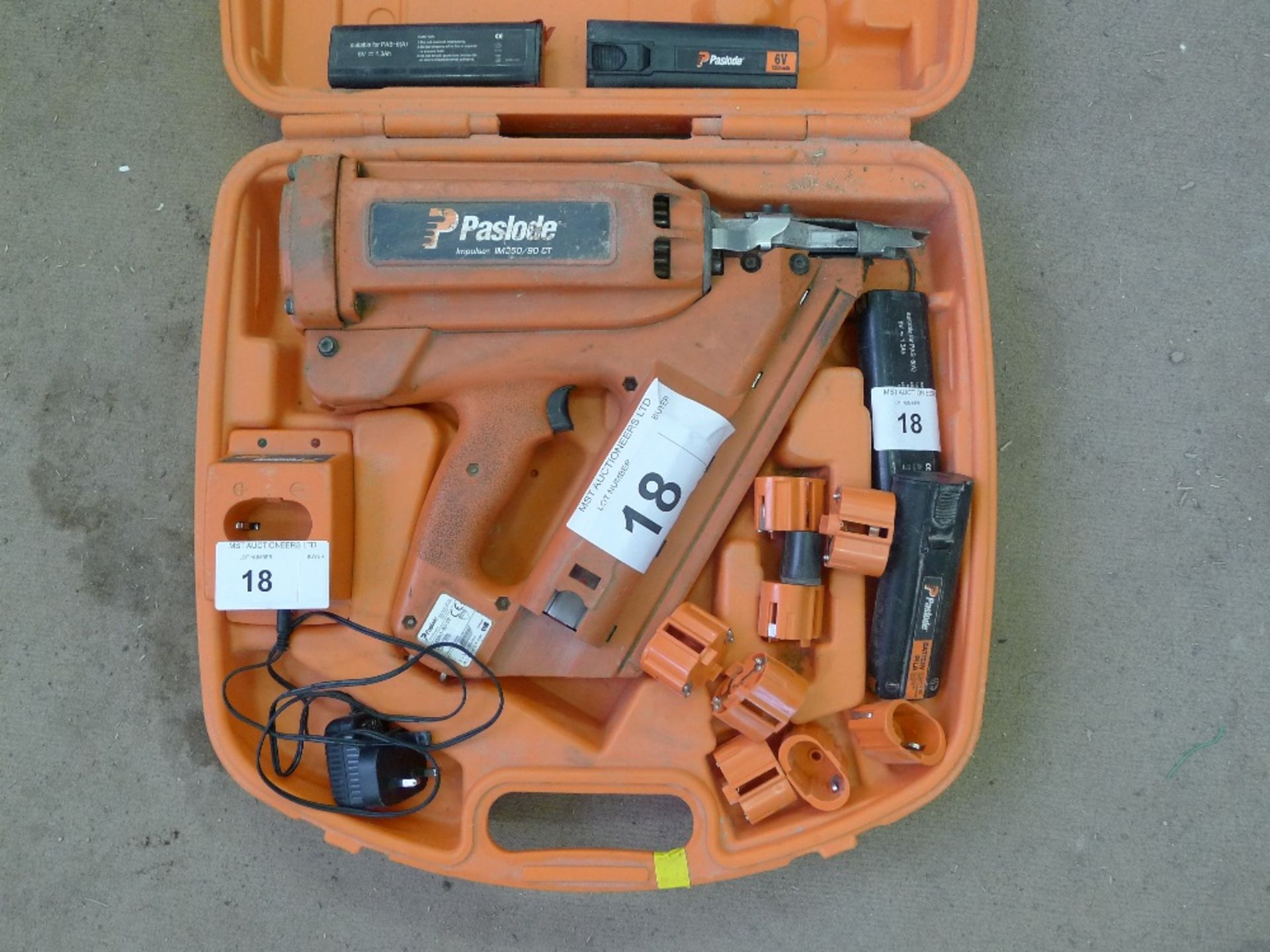 1 Paslode nail gun type Impulse IM350/90CT with 2 batteries & 1 charger