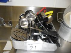 Various utensils. Includes, scoops, spatulas, ladles. Please see photo for more details.