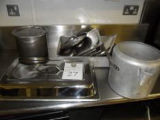 Assorted catering pans and lids in stainless steel.