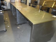 Stainless steel counter servery system. Has been disconnecting from source. Panels have been removed