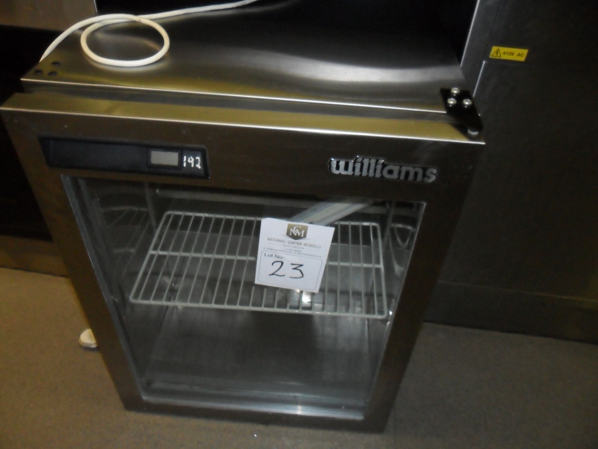 Williams undercounter style fridge with glass door 56cm d 61cm w 79cm h.