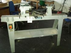 Draper variable speed wood lathe on stand.
