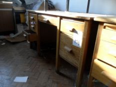 Wooden desk with drawers.