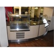 Counter servery system. 360cm wide glass shelves,