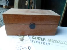 Wooden case with opening wheel that turns to open the box... revealing... A Philip Haris OHMS No