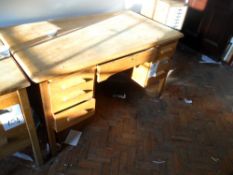 Wooden desk with drawers.