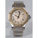 CARTIER SANTOS. Damenarmbanduhr. Gehäuse in Stahl/gold. Uhr ohne Funktion/defekt/ungeprüft.