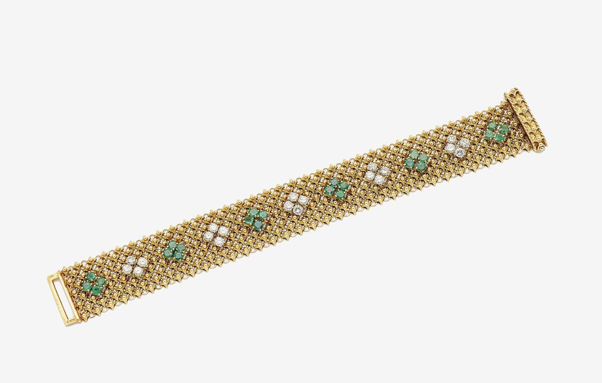 Armband mit Brillanten und Smaragden Paris, 1930er Jahre Gelbgold 750/- und Platin, gestempelt.