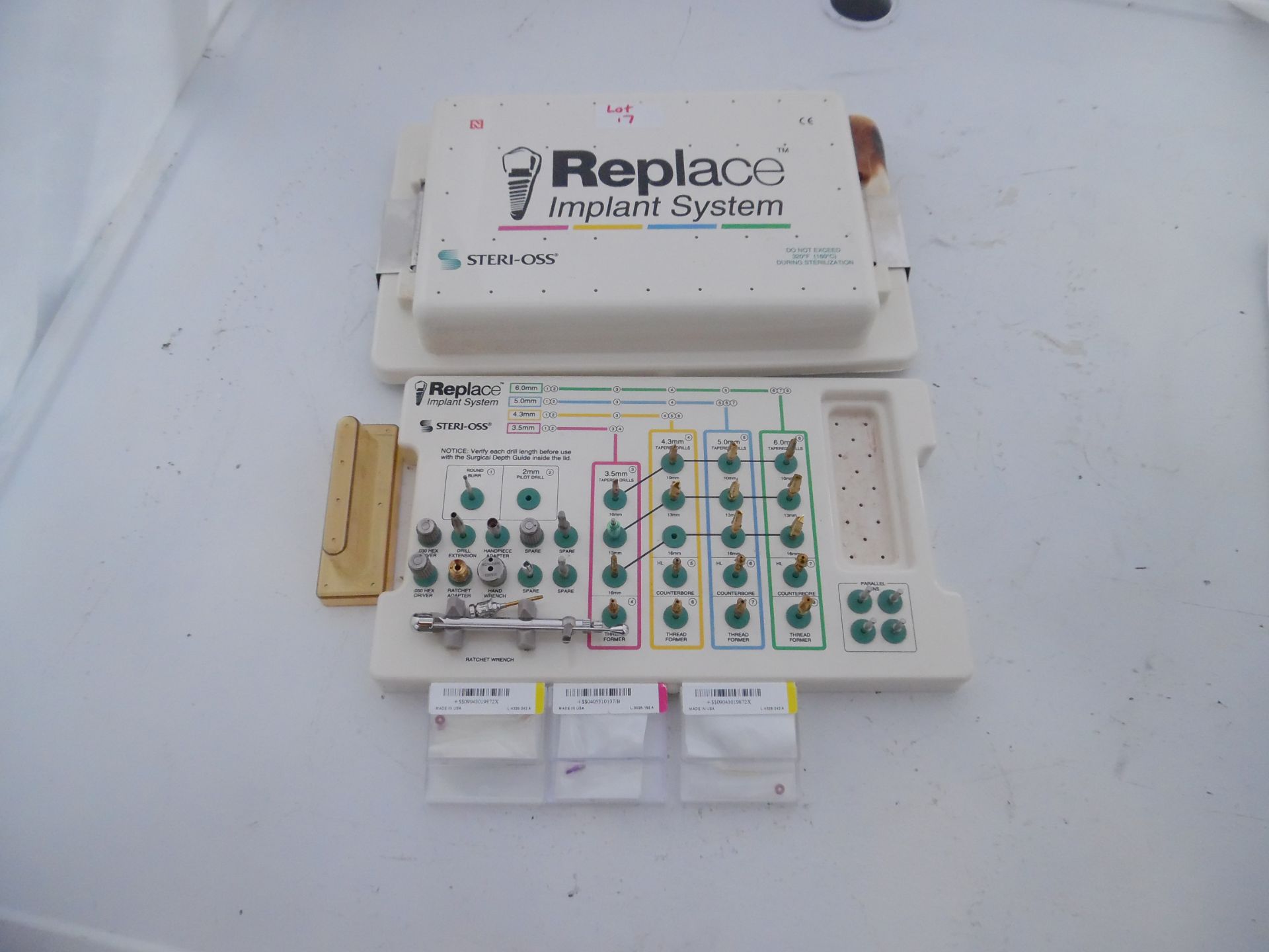 Steri-Loss Replace Implant Sytems. Top of the plastic case has a burn mark on it.