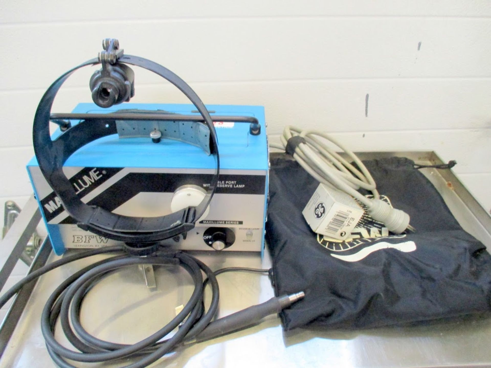 BFW 150-1 Light Source with headgear, handpiece, new bulb and carrying bag.