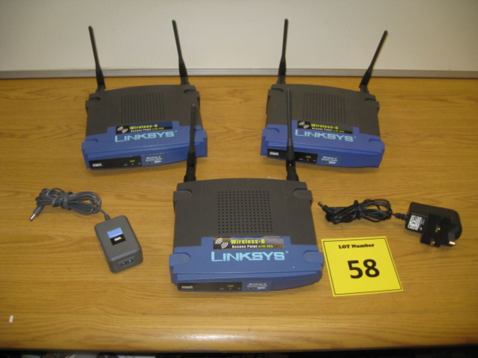 3 X CISCO LINKSYS WIRELESS ACCESS POINTS WITH SES. MODEL WA P54G. WITH 2 X LINKSYS POWER SUPPLIES