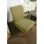 FURNITURE/ HOME -A vintage/ retro low bedroom chair in yellow & green fabric.