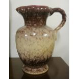 CERAMIC/ VINTAGE - A small German fat lava ceramic jug stamped 'Germany 556/ 20' to base,