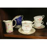 ANTIQUE/ TEACUPS - Collection of 5 various teacups & saucers. Also included is a decorative milk