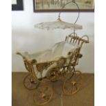 TOYS/ HOME - A replica Victorian dolls/ children's pram with lace canopy.