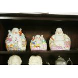 FURNITURE/ HOME - A collection of 3 ceraic ornimental Buddah's.