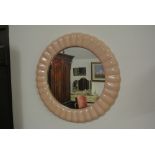 FURNITURE/ HOME - A ceramic pink framed mirror.