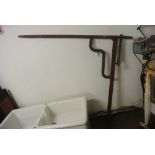 ANTIQUE/ INDUSTRIAL - A large antique cast iron fire crane & hinge.