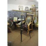 HOME/ FURNITURE - A large brass antique style telescope on black wooden tripod with no visable