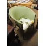 FURNITURE/ HOME - A vintage Lloyd Loom chair, painted green, with floral seat.