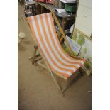 VINTAGE/ RETRO - An original vintage oak framed deck chair with orange & white material.