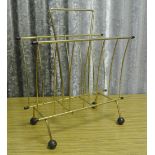 VINTAGE/ HOME - A fantastic Atomic style 1950's magazine rack with black ball feet.