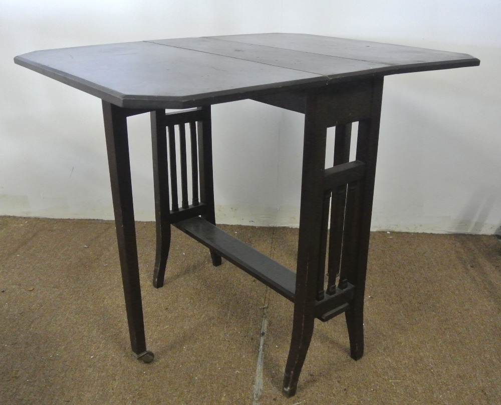 FURNITURE/ HOME - A small wooden drop leaf side table (missing one castor) - Image 2 of 3