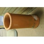 HOME/ GARDEN - A large terracotta chimney pot.