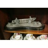 MULLINGAR PEWTER - A Mullingar pewter scene of fishermen repairing their nets on the shore, with