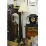 FURNITURE/ HOME - A modern standard brass lamp with shade.