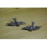 SILVER & MARCASITE BROOCH: A pair of two sterling silver bird brooches inset with marcasite. Each