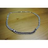 VINTAGE RHINESTONE NECKLACE: A striking collar style necklace in clear rhinestone and imitation