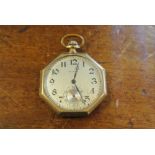 POCKET WATCH - An octagonal cased Waltham pocket watch with Arabic numeral dial & subsidiary seconds