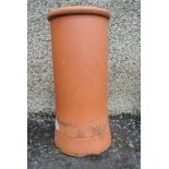 HOME/ GARDEN - A large terracotta chimney pot. Mea