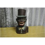 CAST IRON/ MONEY BOX - A vintage 'Jolly Nigger' no