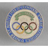 1928. St Moritz. Badge officiel (n°659) des 2ème Jeux d’Hiver ayant appartenu à Jean d’Aulan.