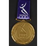 2001. Tunis. Médaille de participant au XIVème Jeux Méditerranéens. En bronze doré. Diamètre 70