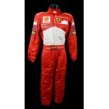 Michael Schumacher. Combinaison de l’équipe Ferrari utilisée entre 1999 et 2001. Marque OMP. Nom