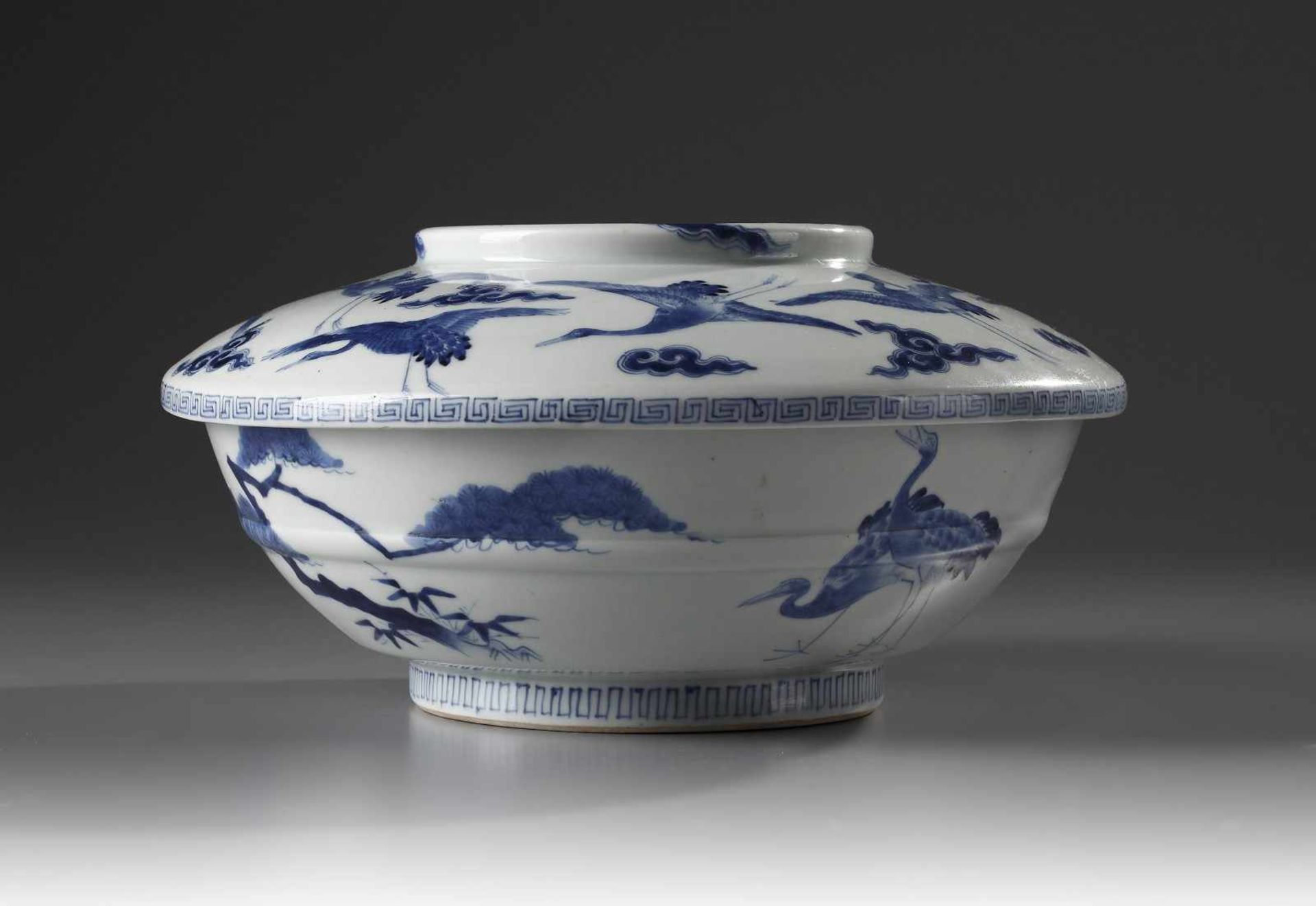 Japanese Hirado Porcelain Bowl with Cover of rounded form, decorated in underglaze blue with a